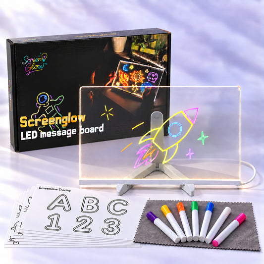 ScreenGlow LED drawing board 12 x 8 in lit up with a neon rocket, with the box, 7 neon markers on a gray cloth and tracing sheets